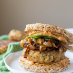 Italian-Style Chickpea Burgers: packed with healthy, vegan, and gluten free ingredients and topped with caramelized onion, hummus, and basil! Perfect for Father's Day and summer cookouts! || fooduzzi.com recipe