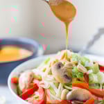 Thai Zucchini Noodle Bowls: A quick 15-minute meal that's gluten free, vegan, and healthy! The creamy nut butter sauce is out-of-this-world! || fooduzzi.com recipes